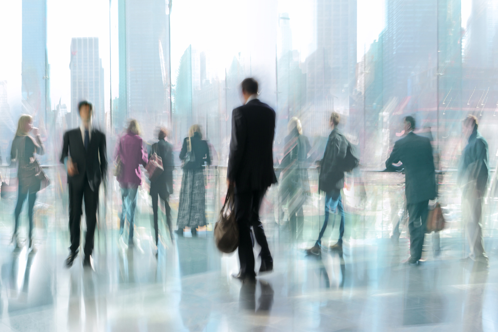 inversionistas-01_0003_layer-3 business people group with headphones giving support in help desk office to customers, manager giving training and education instructions